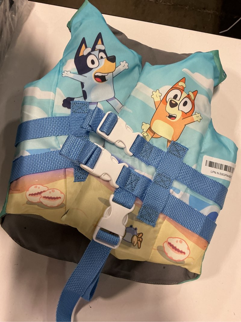 Condition photo showing As Is for swimways bluey life jacket, us coast guard approved kids swim vest, 33-55 lbs, bluey