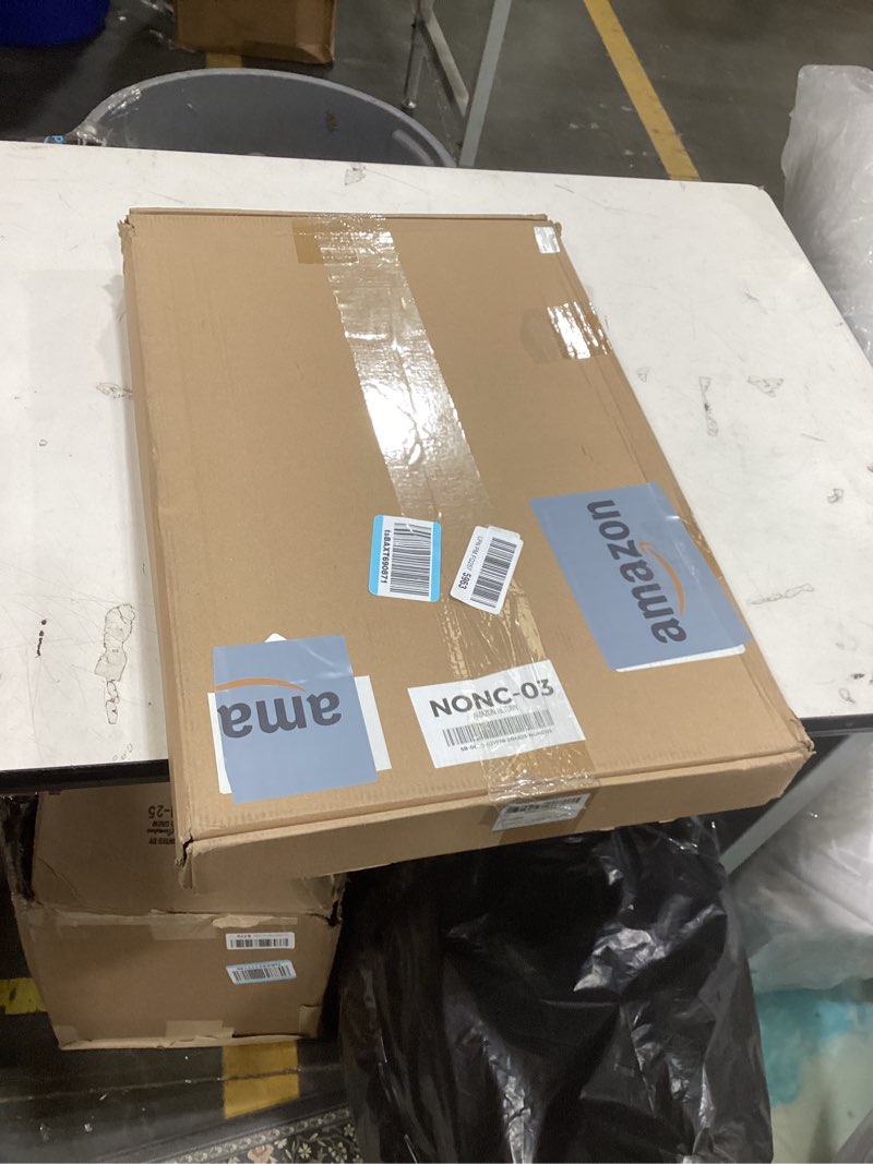 Condition photo showing Good Condition for the pictured item is a coastal-themed framed canvas wall art piece depicting a serene seascape with soft green and white hues, likely similar to pieces produced by stupell industries or artist shaina page.  