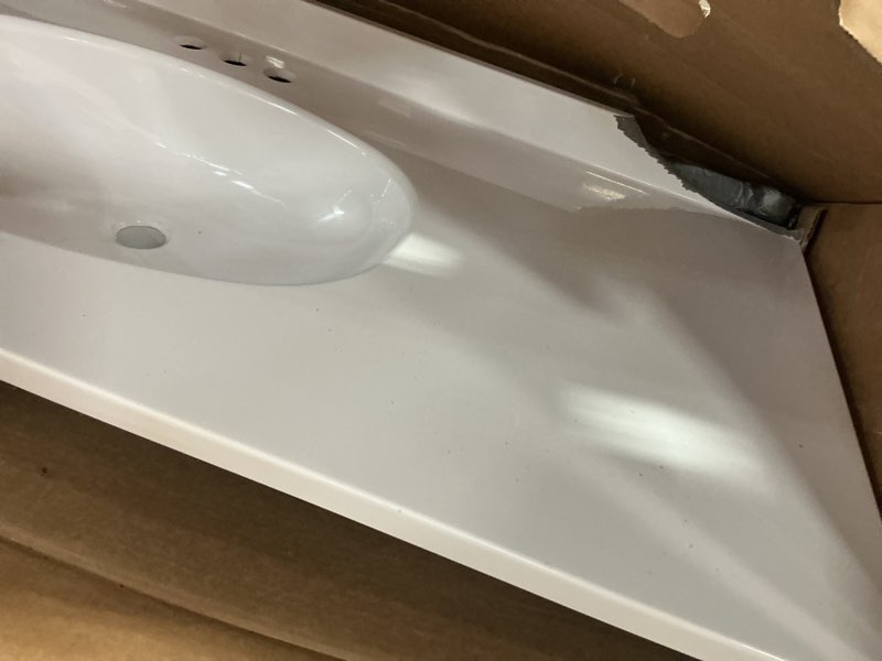 Condition photo showing As Is for project source cultured marble vanity tops 49-in x 22-in white cultured marble integral single sink 3-hole bathroom vanity top