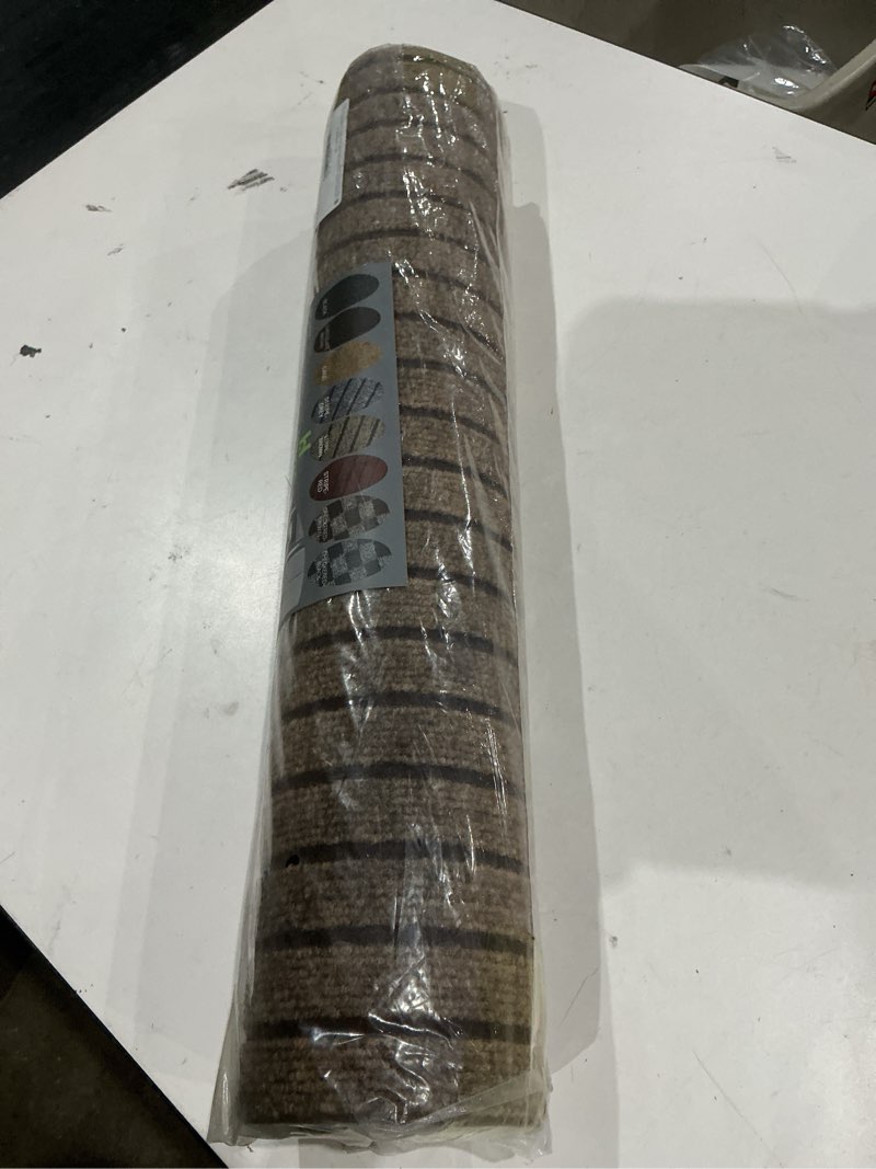 Condition photo showing Good Condition for 2' x 8' runner rugs with rubber backing, indoor outdoor utility carpet runner rugs, stripe brown, can be used as aisle for the rv and boat, laundry room and balcony