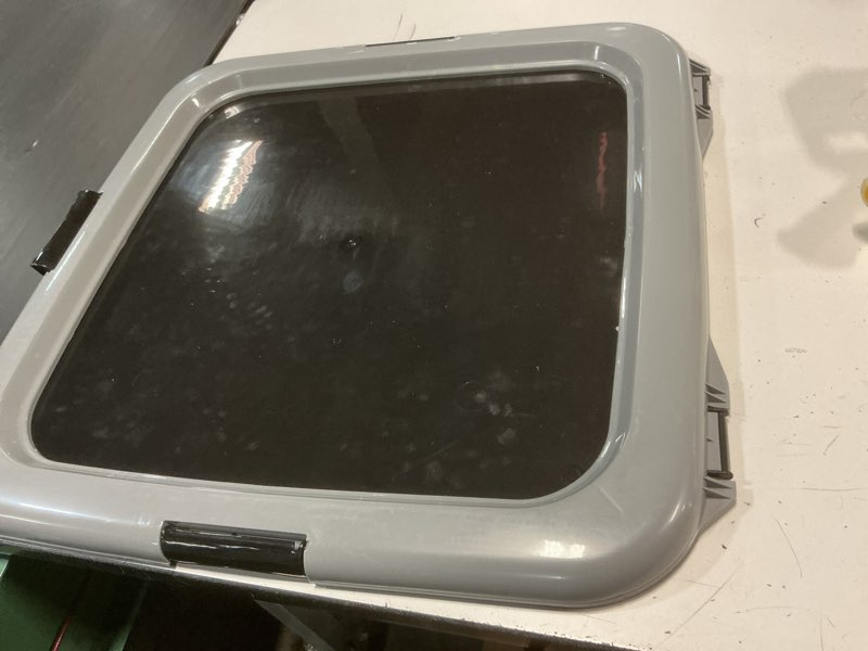 Condition photo showing As Is for iris usa pee pad holder - for regular sized dog and puppy pee pads, secured latches, non-skid feet, high polish finish for easy cleaning, leak protection, fits 22"x22" pad or larger, black/gray