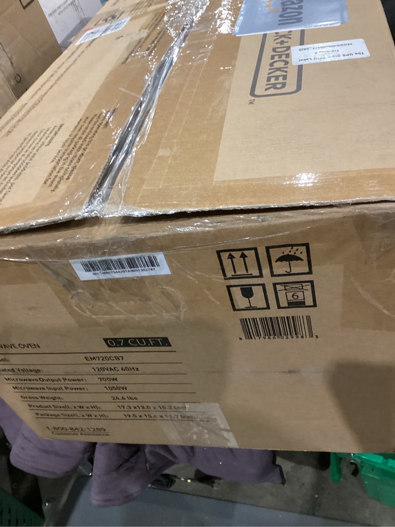 Condition photo showing As Is for BLACK+DECKER EM720CB7 Digital Microwave Oven with Turntable Push-Button Door, Child Safety Lock, 700W, Stainless Steel, 0.7 Cu.ft 0.7 cu. ft.