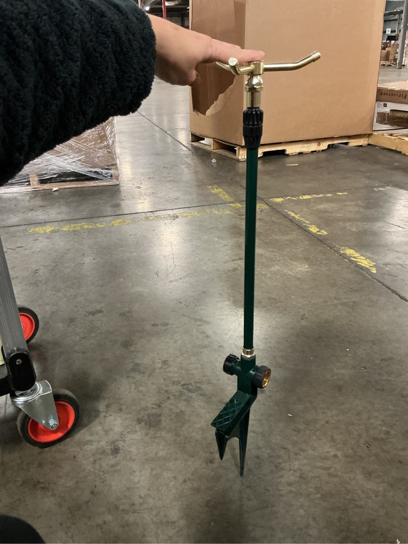 Condition photo showing Good Condition for orbit 2000-sq ft rotating spike lawn sprinkler