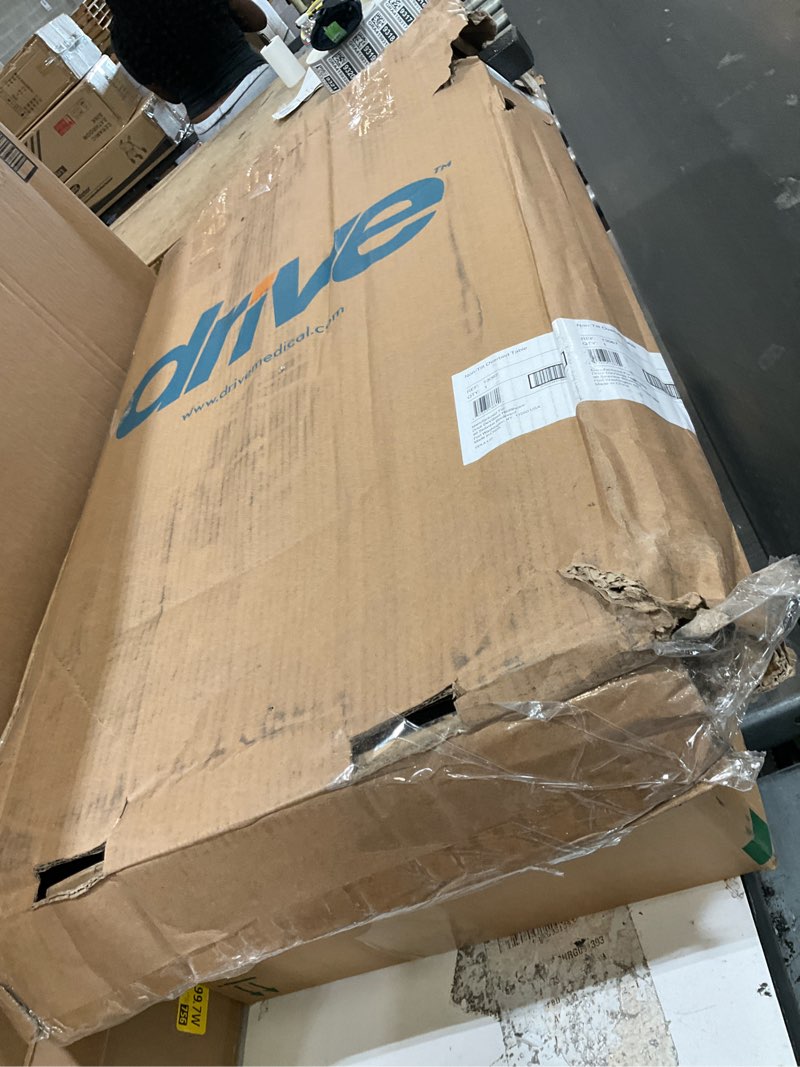 Condition photo showing As Is for drive medical overbed table with wheels - secure height adjustment for comfort - non tilt surface - smooth rolling design - home & hospital use - woodgrain laminate top - silver vein silver vein table