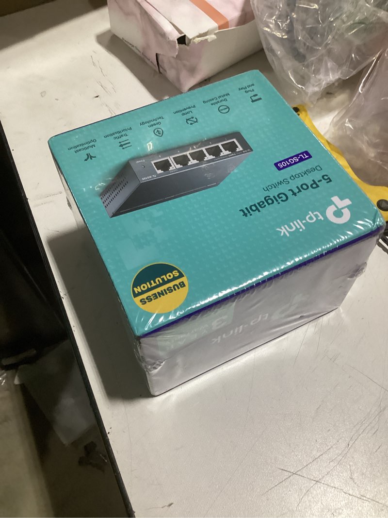 Condition photo showing New/Like New for tp-link tl-sg105, 5 port gigabit unmanaged ethernet switch, network hub, ethernet splitter, plug & play, fanless metal design, shielded ports, traffic optimization 5 port | 1g