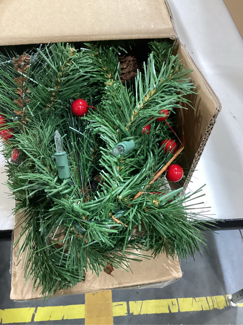 Condition photo showing Good Condition for national tree company 9 ft pre-lit crestwood spruce artificial christmas garland, christmas decoration with glitter, pinecones, red berries, 50 clear lights, 180 tips, green plug in tree