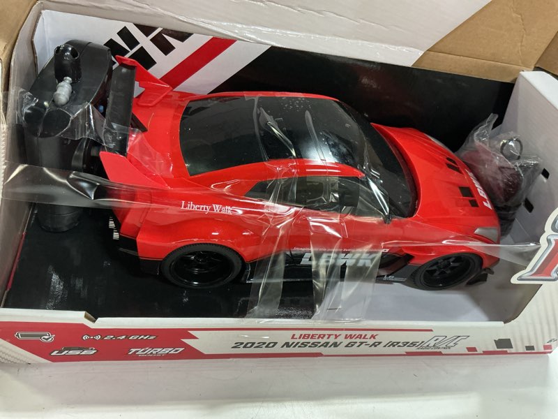 Condition photo showing As Is for jada 2020 nissan gt-r r35 liberty walk – 1:16 rc – usb rechargeable with turbo boost, radio control cars (red)