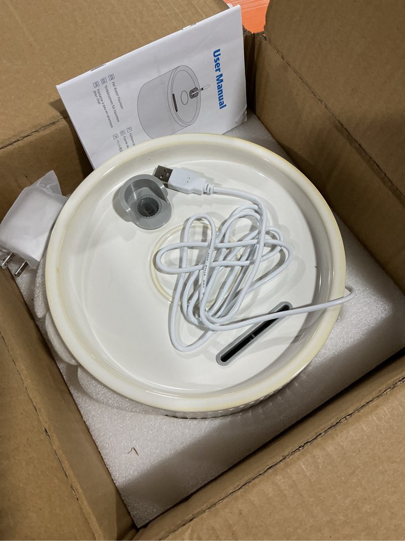 Condition photo showing Good Condition for Ceramic Cat Water Fountain - 2.1L/71oz - All-Ceramic Body & Pure Copper Water Spout - Non-Toxic - Automatic Pet Drinking Fountain Indoor with Ultra-Quiet Pump, and 3Pcs Filter & Sponge (Beige) Beige Ceramic Cat Fountain