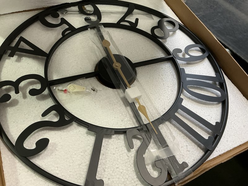 Condition photo showing Good Condition for LEIKE Large Wall Clocks for Living Room,Silent,Non Ticking,Battery Operated Oversized Vintage Round Modern Metal Wall Clock for Bedroom,Farmhouse,Office Home Decor-24 Inch(Black-Arabic Number) 24 IN Black Metal-arabic Number