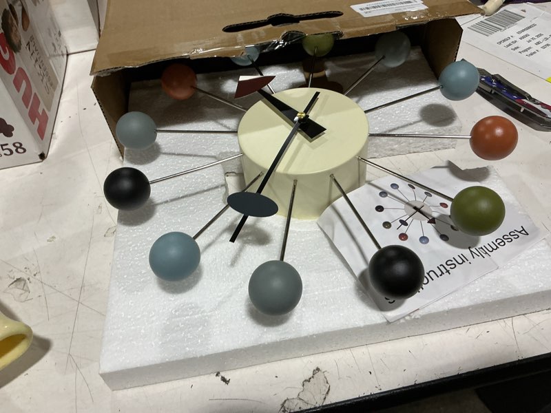 Condition photo showing Good Condition for wood ball wall clock 13 inch, mid century modern | battery operated, silent non-ticking, pop color, metal frame, decor for living room, office, kitchen 13 inch pop color ball