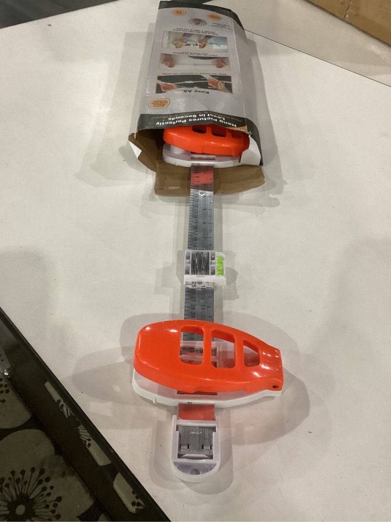 Condition photo showing Good Condition for all in one picture hanging system! precisely measure the frame dimensions, level it horizontally, precisely select the nail positions for the picture frame. easily install picture frames by yourself.