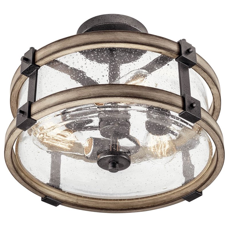 Condition photo showing Good Condition for barrington ceiling light  semi-flush mount  3-light  clear seeded glass  size:10.56" h x 14" dia  model:38190a barrington 3 light semi-flush mount features anvil iron and driftwood to create a traditional design. with clear seeded glass, it's sure to enhance the nostalgic touch you're looking for.