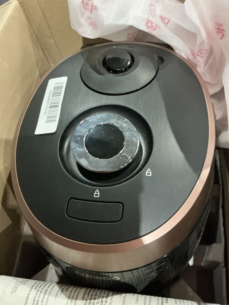 Condition photo showing As Is for cuckoo high pressure rice cooker 6-cup uncooked / 12-cup cooked with nonstick inner pot, versatile rice maker with 12 menu options and steam plate, fuzzy logic tech, voice guide, black (crp-p0609s) 6 cup black