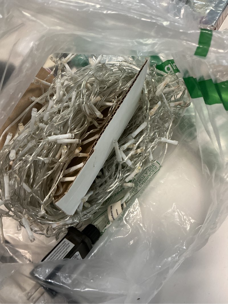 Condition photo showing As Is for (Similar )DEPOVOR Christmas LED Icicle Curtain Fairy Lights Outdoor Indoor Hanging String Lights 32.8ft 400 LED 8 Modes Lights for Xmas/Party/Easter/Thanksgiving/Halloween/Wedding Decorations (Warm White)