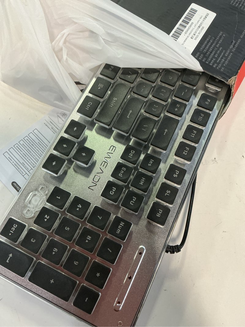 Condition photo showing New/Like New for eweadn gx710s backlit computer keyboards, wired usb keyboard with white backlit, metal panel, plug and play, pudding keycaps full size quite computer keyboard for win/pc/laptop-black black&white