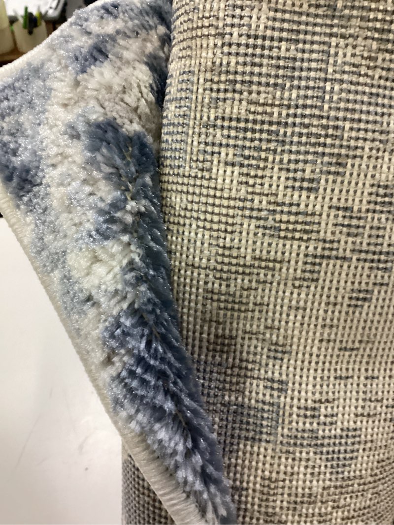 Condition photo showing Good Condition for amelia 5 ft. x 8 ft. dark blue/gray distressed abstract area rug