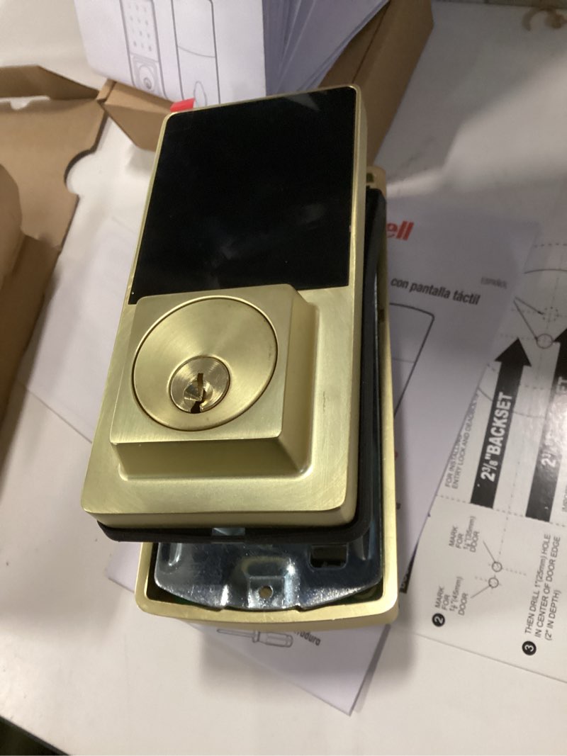 Condition photo showing As Is for Honeywell Satin Gold Electronic Deadbolt Touchscreen Keypad