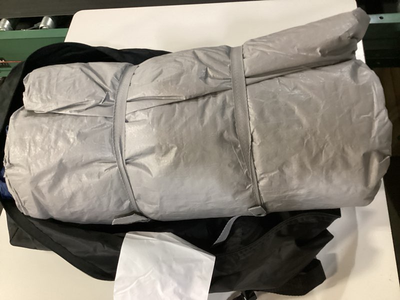Condition photo showing New/Like New for campros cp 12 person camping tent, 3-room family tent, rainfly, waterproof | windproof double-layer design with 2 divider curtains, 6 large mesh windows, easy setup, and a carry bag, 20' x 9' x 72"(h) dark blue