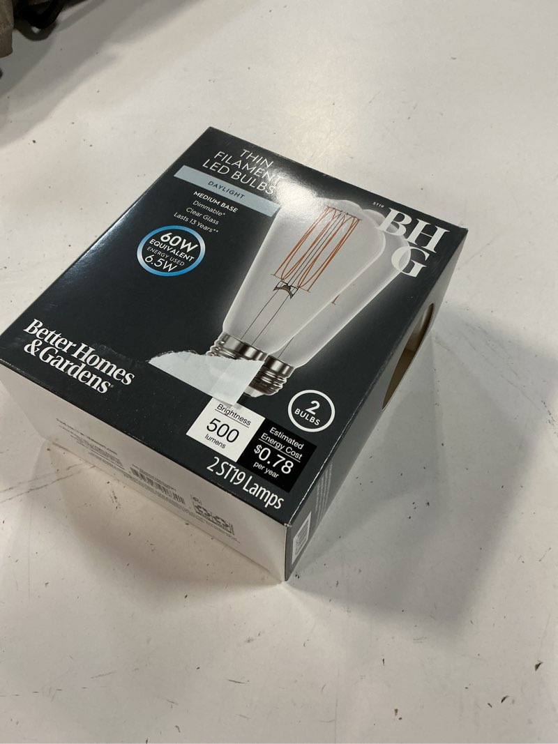 Condition photo showing New/Like New for better homes & gardens 6.5w (60w equivalent) daylight dimmable st19 thin filament light bulb e26 base 2 pack
