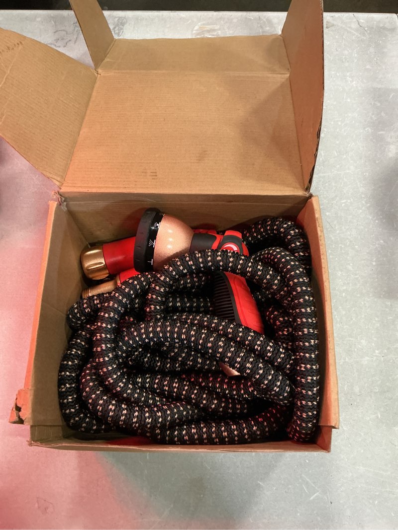 Condition photo showing As Is for pocket hose 75 ft copper head expandable garden hose with pocket pivot, no tangles, as seen on tv, 360° swivel, tri-tex tubing, force field jacket, lead-free, no-kink, anti-burst w/apt