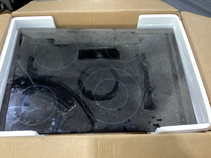 Condition photo showing As Is for empava 30 inch electric ceramic cooktop, 4 radiant burners with dual zone, touch controls, timer, stop & go pause, child lock, etl certified, built-in smooth glass