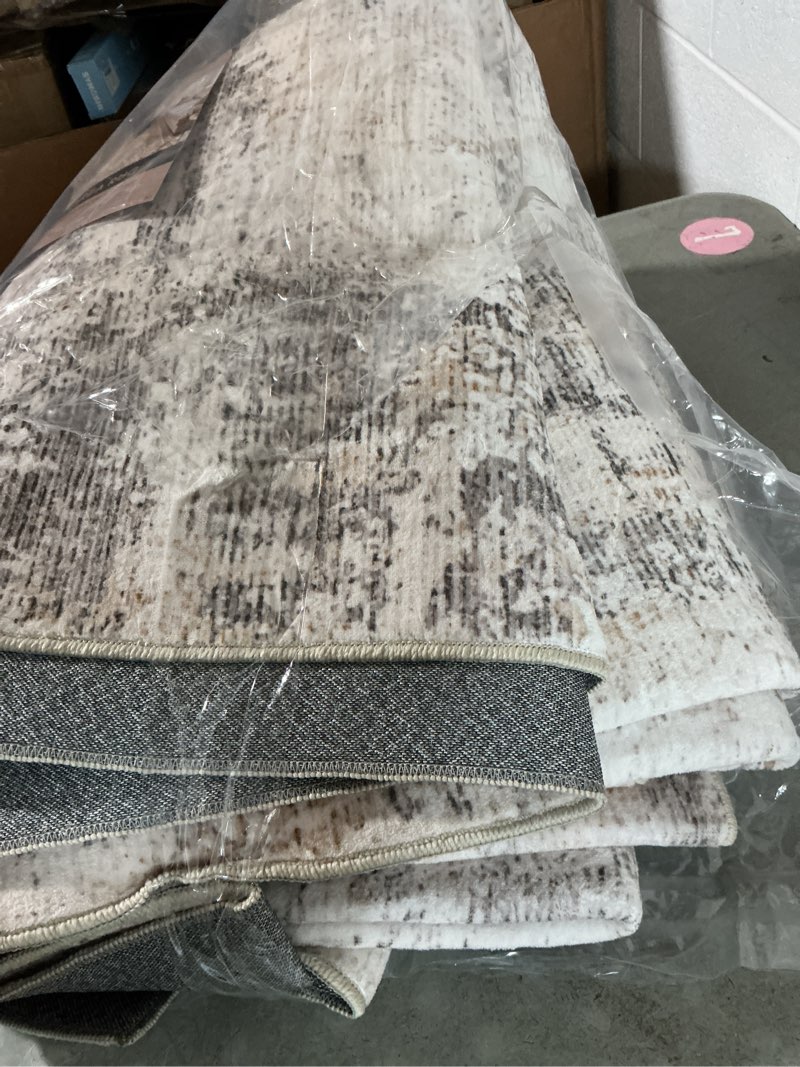 Condition photo showing Good Condition for 8x10 washable area rug beige blue abstract living room bedroom carpet neutral modern non slip soft low pile large throw rug for dining room kitchen office 8' x 10' (rectangular) beige/blue