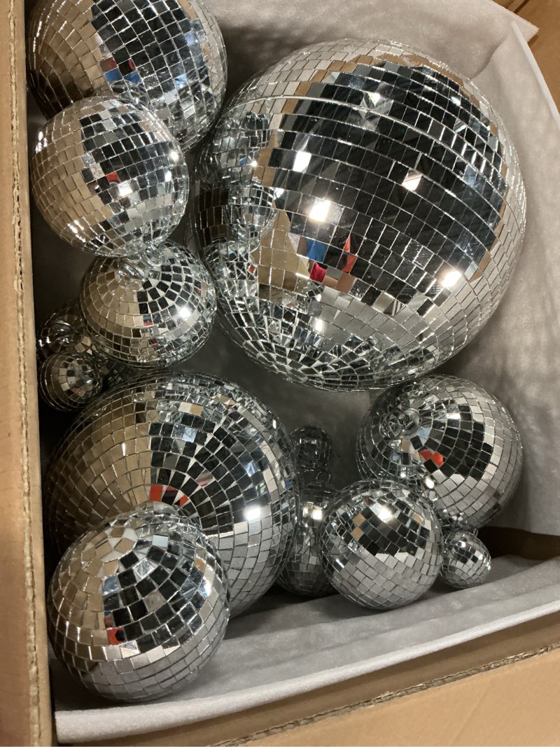 Condition photo showing Good Condition for Haull 8 Pcs Large Disco Ball Set Silver Mirror Disco Reflective Ball with Hanging Ring Party Ornament Decoration for Stage Club Ballroom Dance Hall Wedding Prom Props(12'', 8'', 6'', 4'')