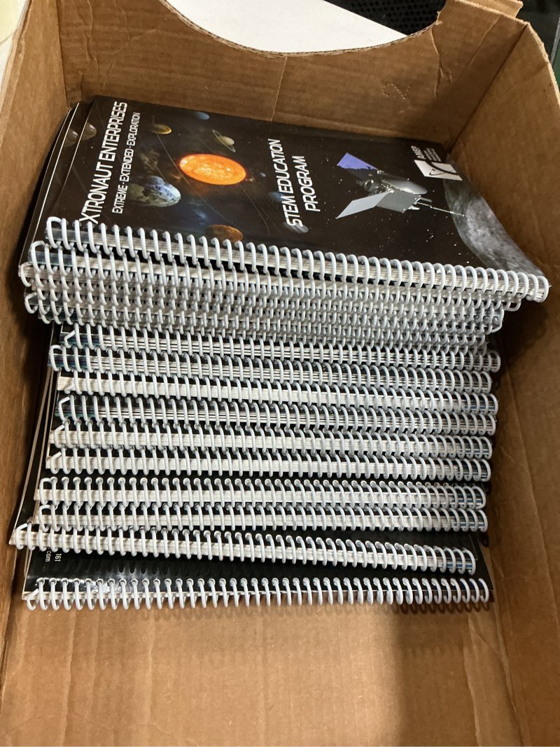 Condition photo showing New/Like New for case of 17 books…xtronaut enterprises stem education program notebook