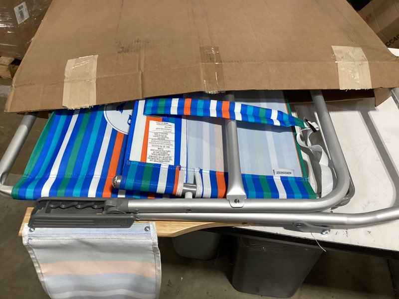 Condition photo showing As Is for tommy bahama 4-position extended seat height easy in-easy out folding backpack beach chair 1-pack logo stripe