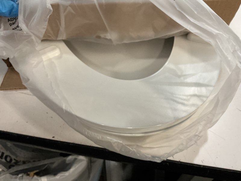 Condition photo showing As Is for kohler stonewood quiet-close elongated toilet seat, slow close design, durable wood, easy installation, universal fit, white finish, k-20466-0