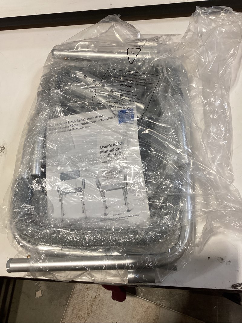 Condition photo showing New/Like New for medline padded transfer bench for bathtub and shower, height adjustable, slip-resistant legs, rust-resistant, side arm & back rest for extra support, 400 lb. weight capacity, tool-free assembly