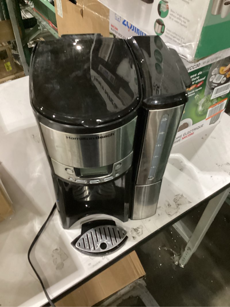 Condition photo showing As Is for Not tested!!! Hamilton Beach One Press Programmable Dispensing 12 Cup Coffee Maker with Internal Coffee Pot, Stays Warm and Fresh for Hours, 60 oz. Removable Reservoir, Black & Stainless Steel (47950) Black and Silver
