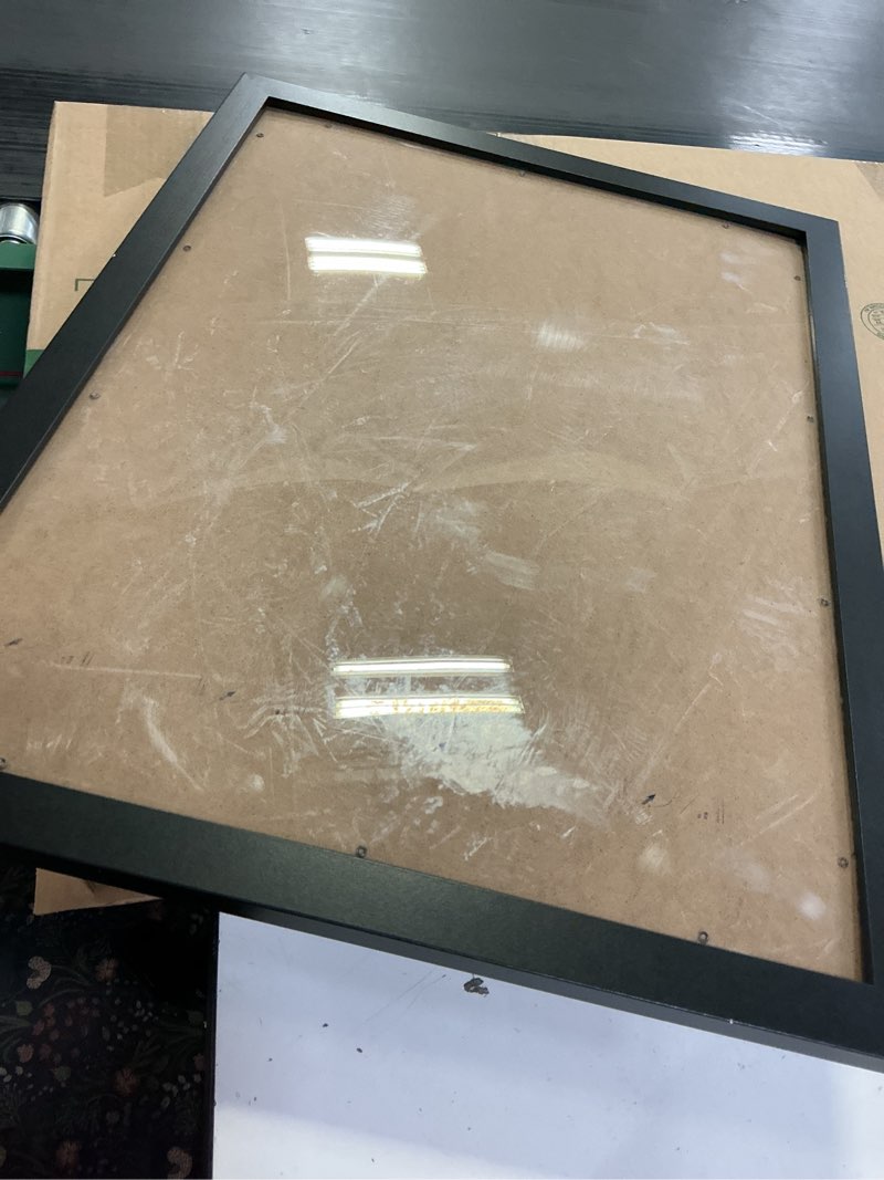 Condition photo showing As Is for Americanflat 18x24 Poster Frame with Polished Plexiglass - Black Picture Frame - Wide Photo Frames Made of Engineered Wood for Vertical or Horizontal Wall Display - Epic Collection - Black Black 18x24