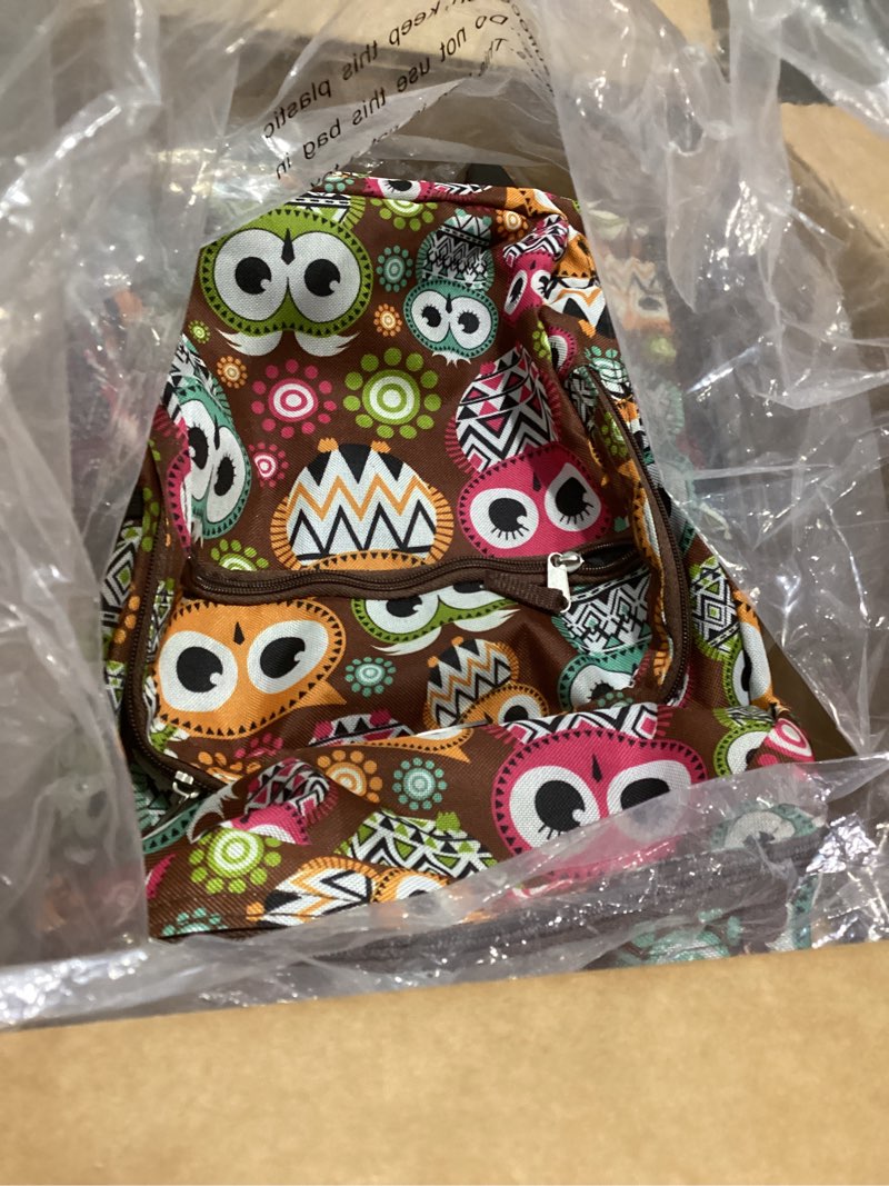 Condition photo showing New/Like New for rockland double handle 17" rolling backpack, owl one size owl