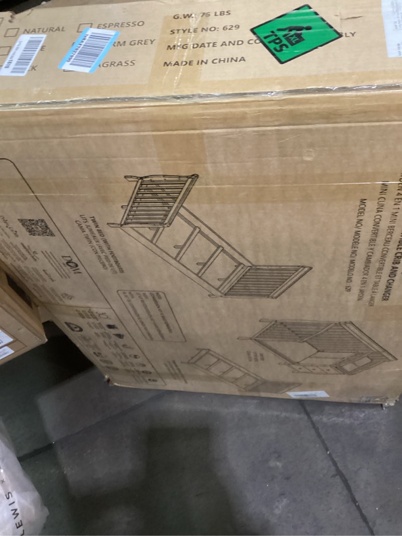 Condition photo showing As Is for Dream On Me Jayden 4?in?1 Mini Convertible Baby Crib & Changer with Storage in Black, Pinewood, GreenGuard Gold & JPMA, 1” Mattress Pad, 3 Mattress Heights, Converts to Mini Day & Twin-Size Bed Black 56.8"L x 29"W x 41"H
