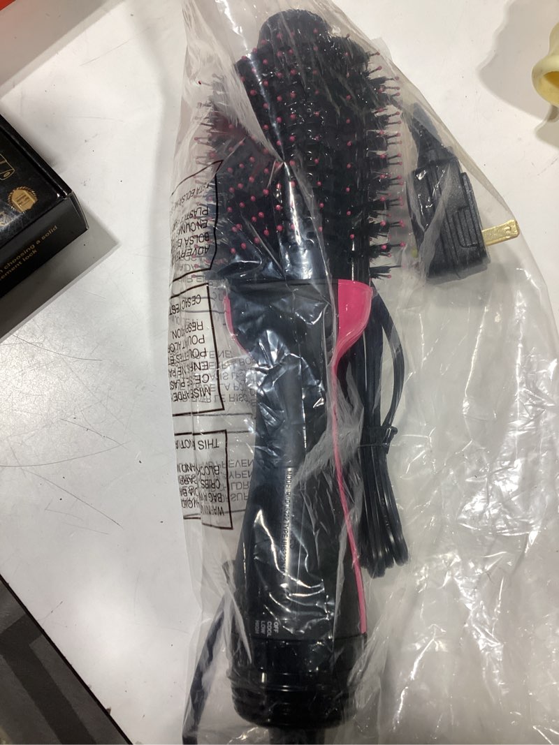 Condition photo showing As Is for revlon one-step volumizer hair dryer and styler