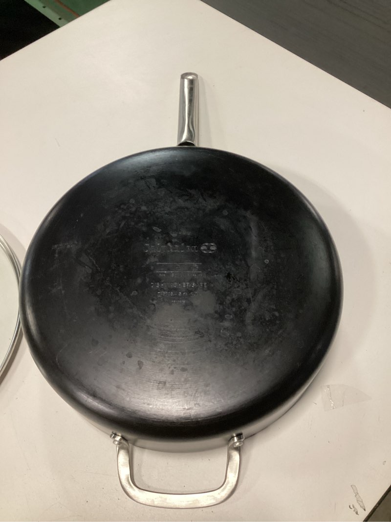 Condition photo showing As Is for Calphalon® Hard-Anodized Nonstick 5-Qt. Sauté Pan with Lid NEW Saute Pan with Lid