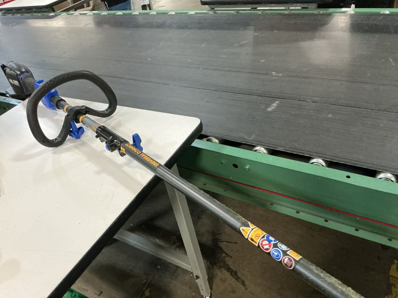 Condition photo showing As Is for kobalt 48v max (24vx2) 15-in attachment capable battery string trimmer kit, (2) 3.0ah batteries and charger included