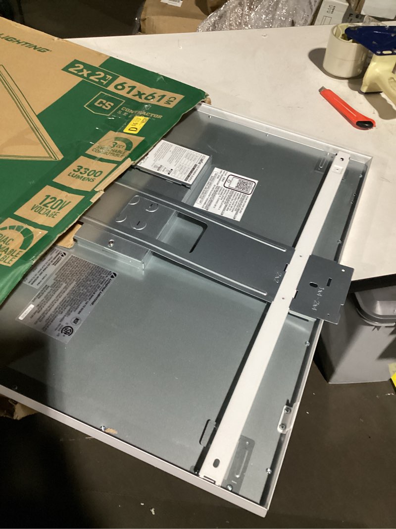 Condition photo showing As Is for Lithonia Lighting CPANL 2x2 LED Flat Panel Light, 2 ft. by 2 ft. LED Light Panel, Ceiling Lighting Fixture, 3300 Lumens, 3500K/4000K/5000K Switchable CCT, Includes Direct Ceiling Mount Bracket, White 2-Foot X 2-Foot 3300 Lumens Switchable White