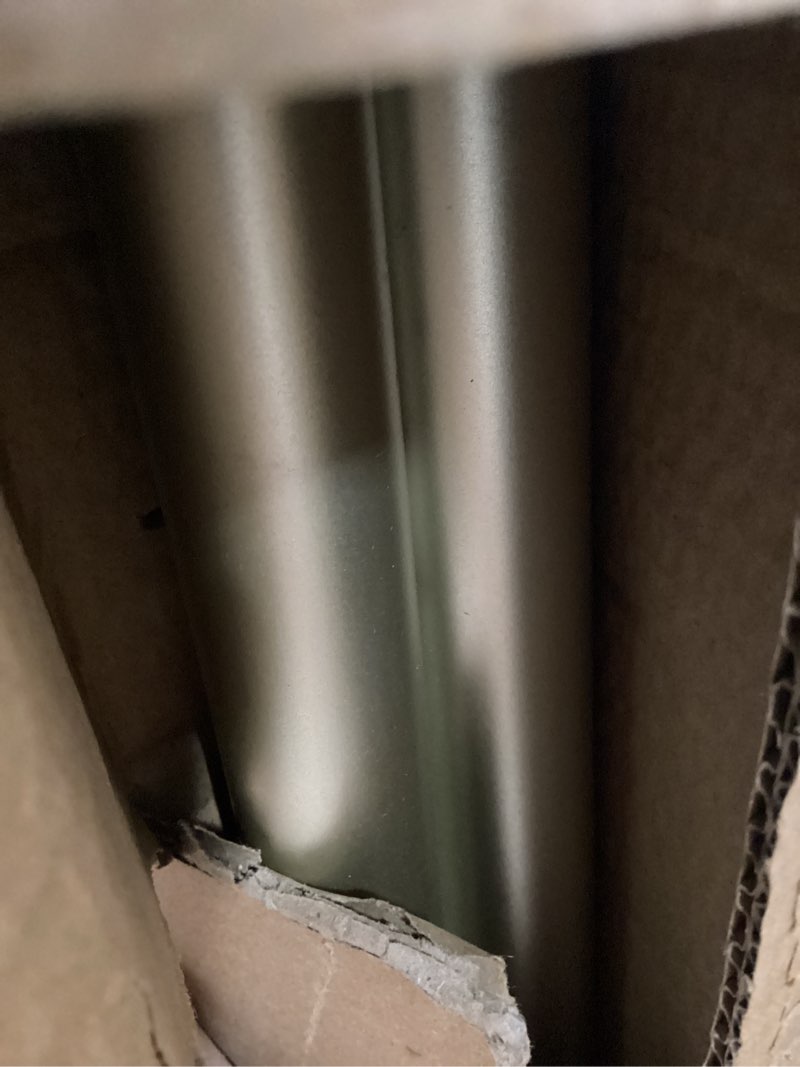 Condition photo showing As Is for exclusive home torch 1" curtain rod and coordinating finial set, matte silver, adjustable 66"-120" matte silver 66-120