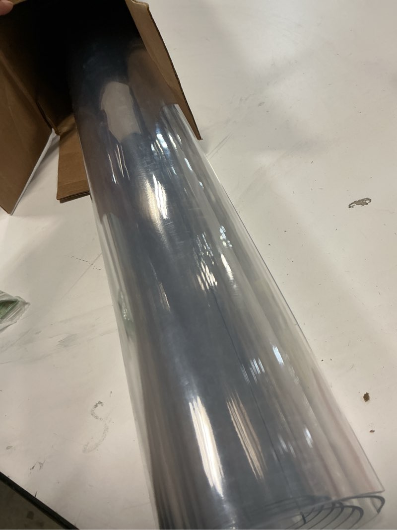 Condition photo showing As Is for NECAUX Custom Multi-Size 1.5mm Thick Clear PVC Table Cover Protector - 36 x 60 Inch Plastic Vinyl Nonslip Floor/Table Mat for 5 Foot Under Office Desk High Chair PC Gaming Computer Table 36" x 60" Clear 1.5mm