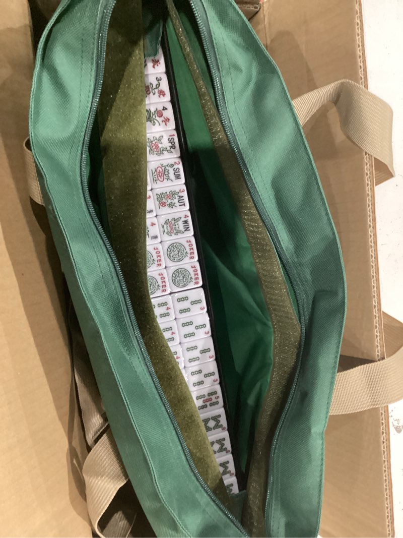 Condition photo showing Good Condition for american mahjong game set, 166 light green tiles, 4 all-in-one color rack/pushers, complete mahjong tile set, light green carrying bag