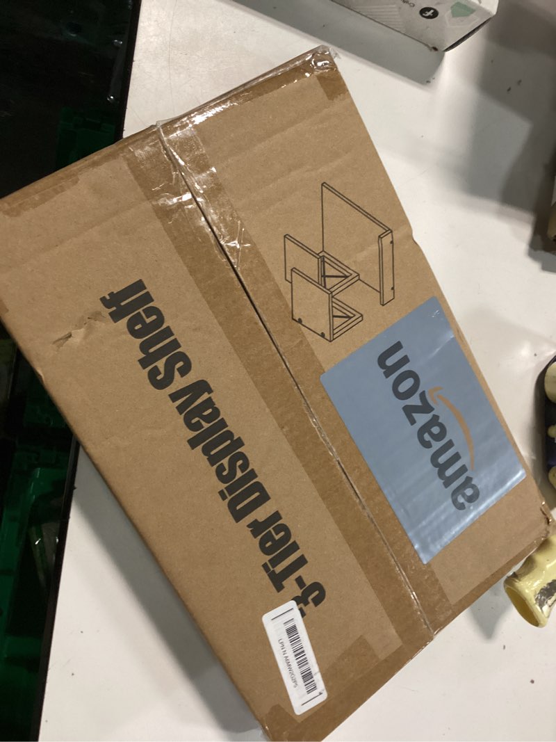 Condition photo showing item condition for ELITEROO Desk Shelf, Wood Small Bookshelf Desktop Shelves and Organizer, Freestanding 3 Tier Storage Display Stand Home Office Decor for Books Plants Toys, White