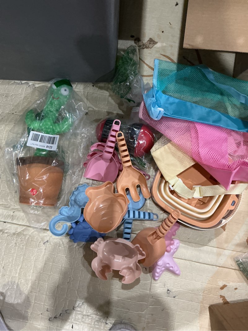 Condition photo showing Good Condition for assorted lot of toys and games 