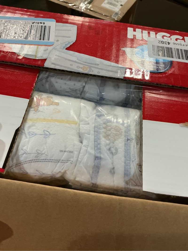 Condition photo showing New/Like New for Huggies Size Newborn Diapers, Little Snugglers Baby Diapers, Size Newborn (up to 10 lbs), 84 Count, Packaging May Vary Newborn 84