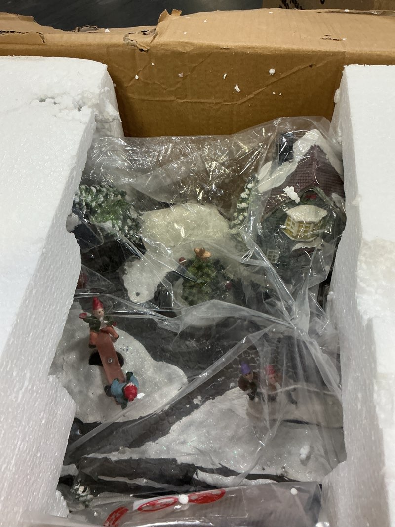 Condition photo showing Good Condition for Alpine Corporation 9" H Indoor Animated Children Playing in Christmas Village Tabletop Decor with 26 Multicolor LED Lights, Holiday Display