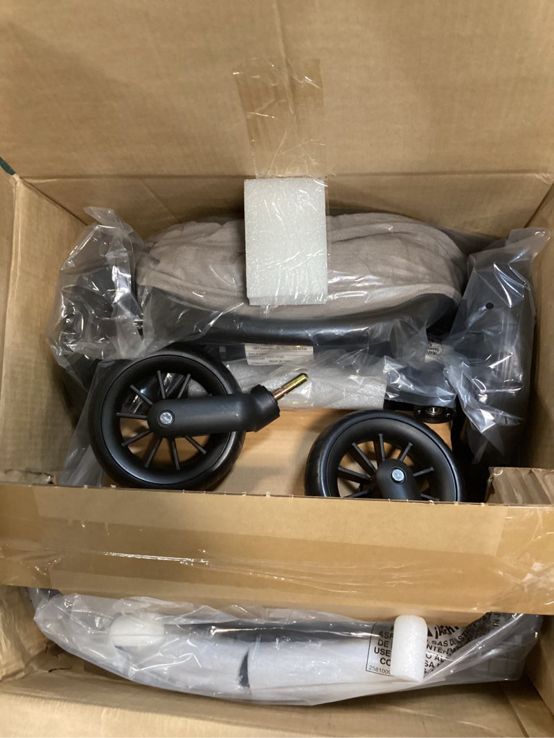 Condition photo showing New/Like New for Evenflo Pivot Modular Travel System with LiteMax Preemie and Infant Car Seat (Desert Tan)