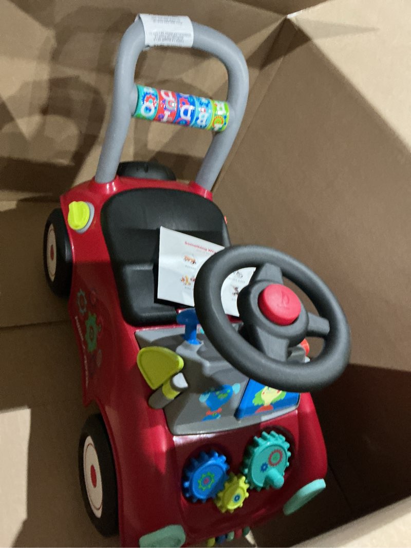 Condition photo showing Good Condition for radio flyer busy buggy, for toddlers 1-3, 3-in-1 push walker ride on car with 17 sensory activities, anti-tip feature, under-seat storage, horn and gears, 42 lb capacity, toddler ride on toys red