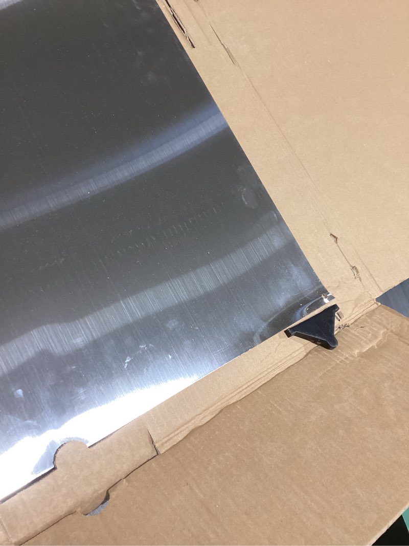 Condition photo showing item condition for 24" x 30" Reversible Metal Backsplash Matching screws | Compatible with Broan-NuTone SP3004 - Ultra Flat and Flushed Metal Panel Splatter Guard for Stovetop Easy Installation 30" x 24" (1 PACK)