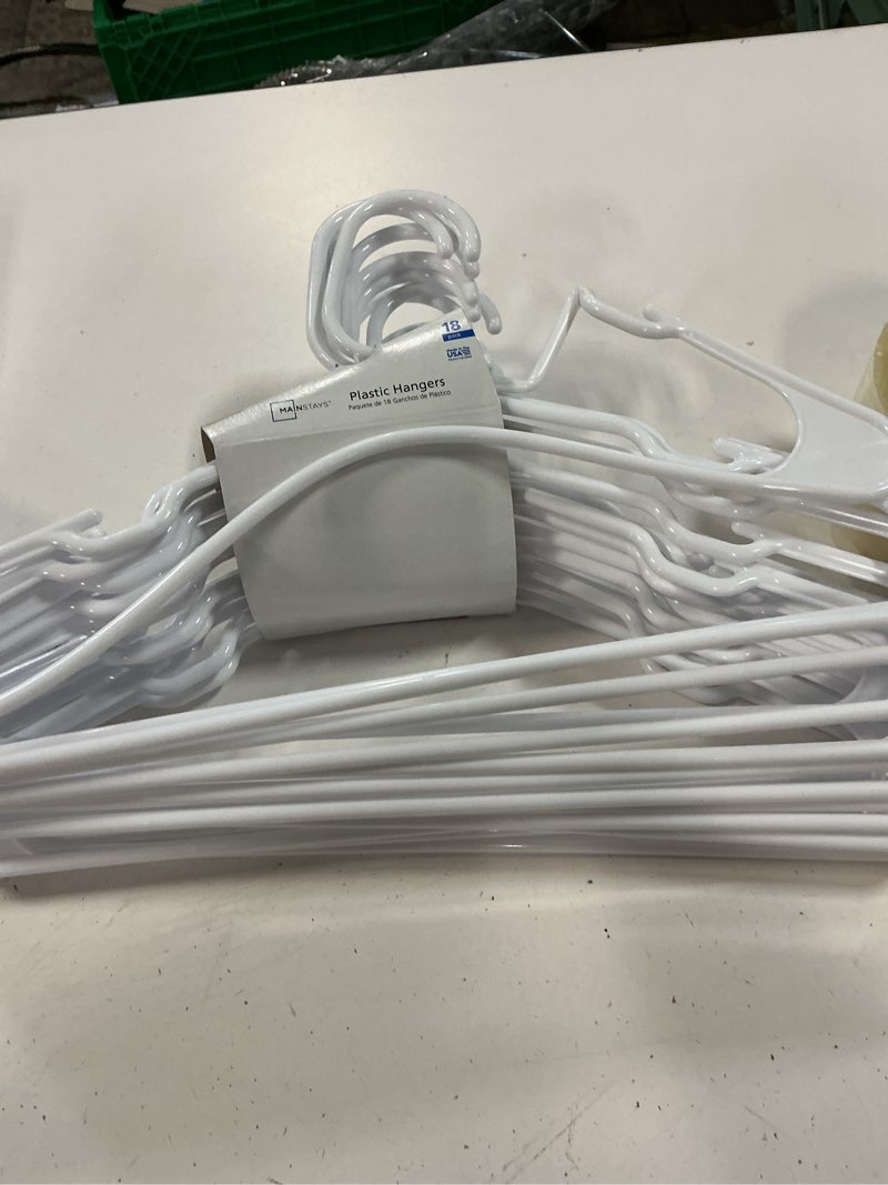 Condition photo showing Good Condition for mainstays plastic clothes hangers, white, 18-count, lightweight & durable for everyday use